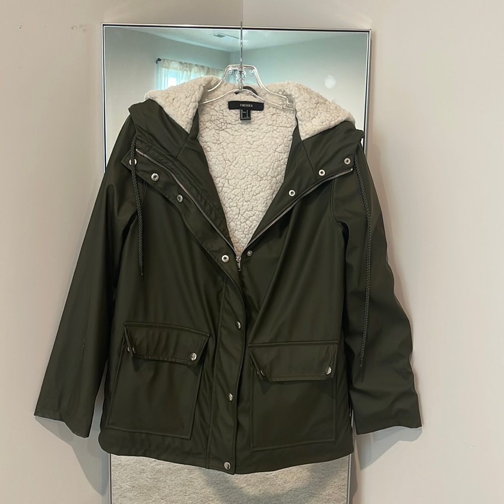 Dark green rain coat